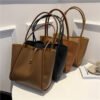 Korean version solid color mother-in-law bag 2025 new women's bag simple portable tote bag large capacity spring fashion shoulder bag