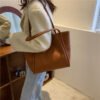 Korean version solid color mother-in-law bag 2025 new women's bag simple portable tote bag large capacity spring fashion shoulder bag
